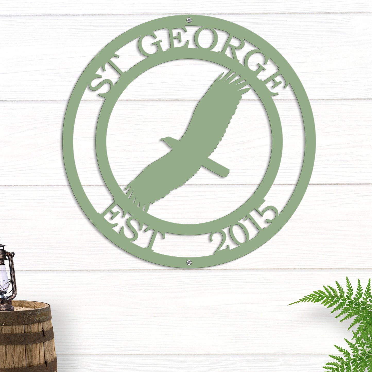 Soaring Eagle Personalized Metal Sign shown in Sage Green on white board wall